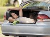 107-Man-sleeping-in-car-trunk.jpg.740x555_q85_box-5,0,1492,1117_crop_detail_upscale.jpg